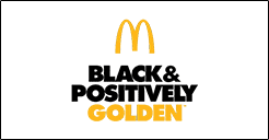 A mcdonald 's logo with the words " black & positively golden ".